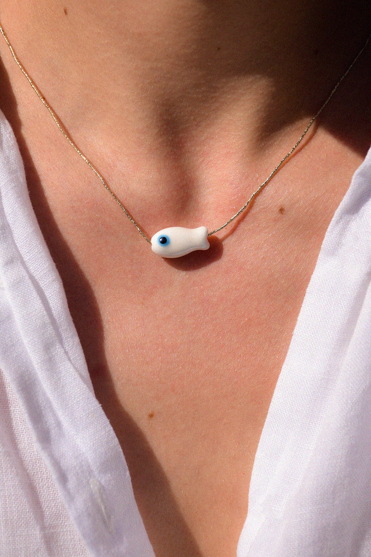 PESCADO | Collier fil d'or et poisson